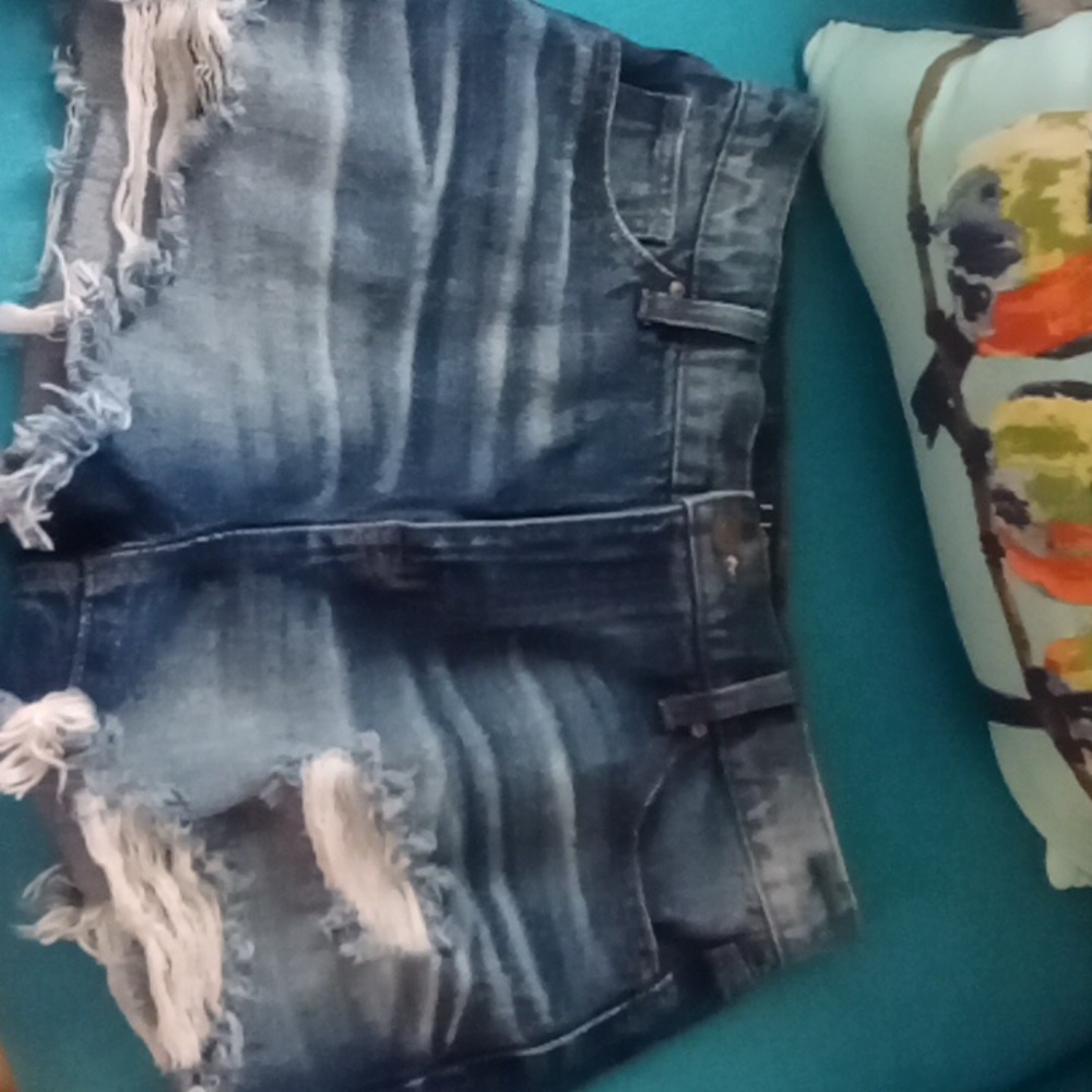 Women's distressed denim shorts